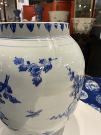 A Chinese blue and white vase and cover with floral sprigs, Transitional period